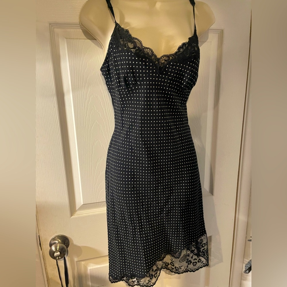 This is a really cute dress super silky feel to it